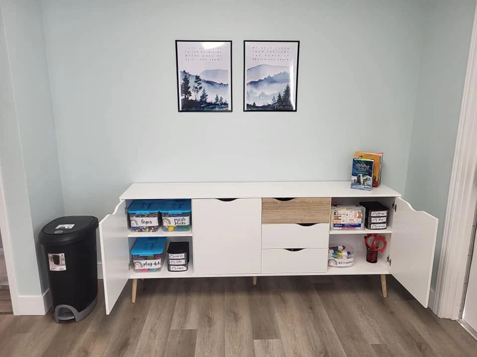 A bright children’s ministry room prepared with toys, books, and activity supplies