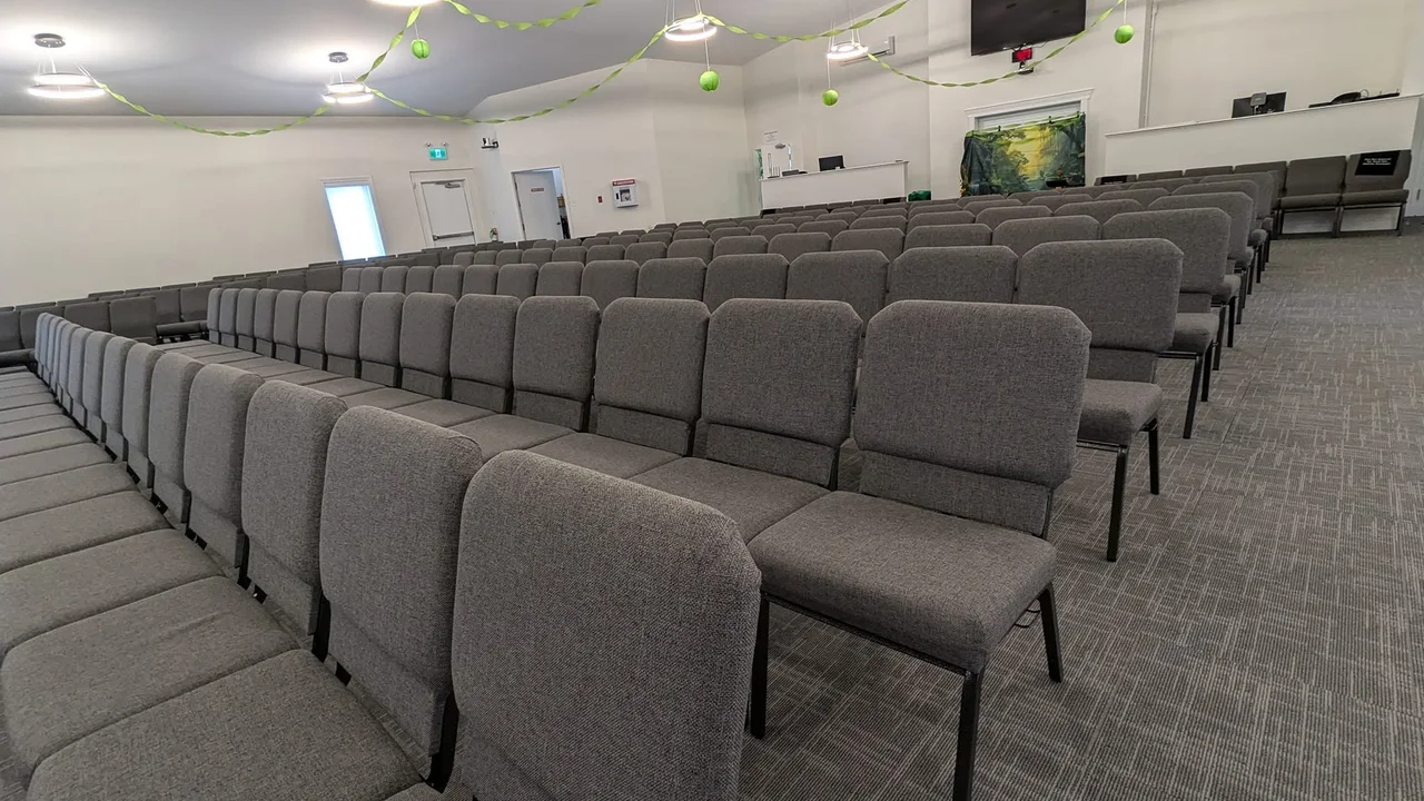 Calvary sanctuary seating prepared for people arriving for a church gathering